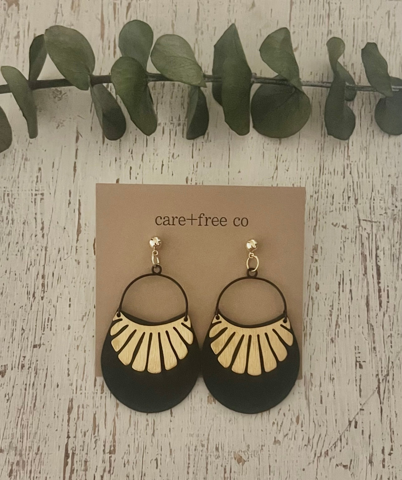 Leather Sun Ray Studs